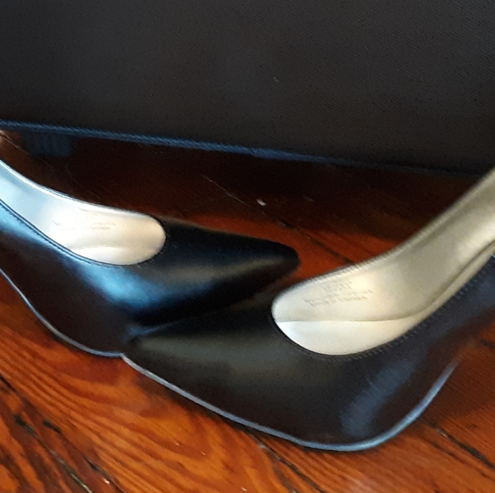 Classic leg length pumps.  Faux leather